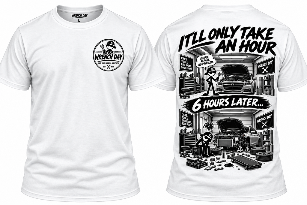 White Wrench Day shirt showing a chest logo and garage-themed back graphic reading It'll Only Take An Hour and 6 Hours Later